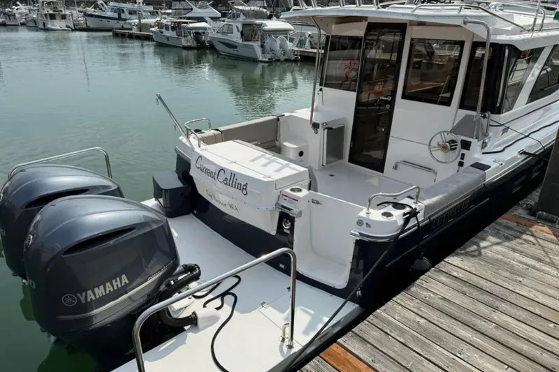  Yacht Photos Pics 2021 Cutwater C-32 Coupe docked with twin Yamaha engines.
