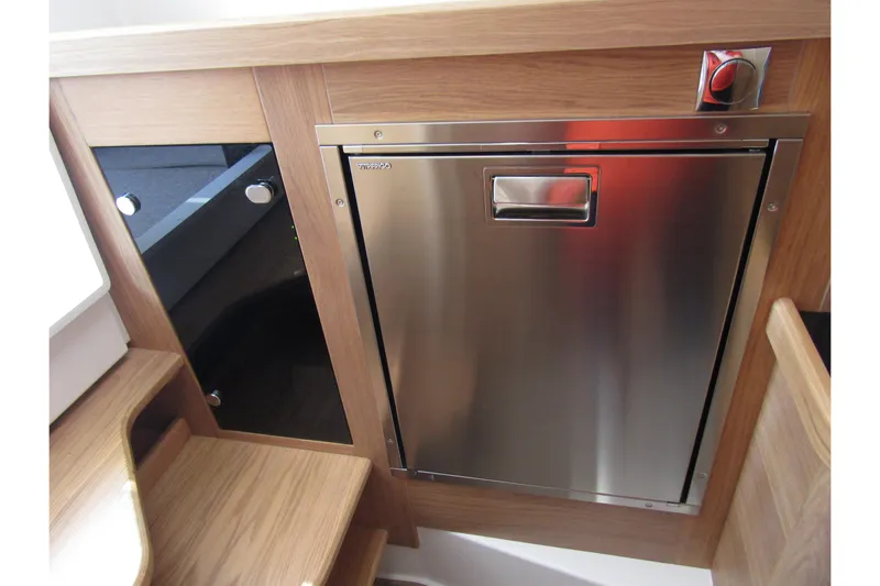  Yacht Photos Pics Stainless steel fridge in 2025 Nimbus Commuter 11 boat interior.