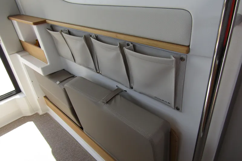  Yacht Photos Pics Interior storage compartments in a 2025 Nimbus Commuter 11 boat.