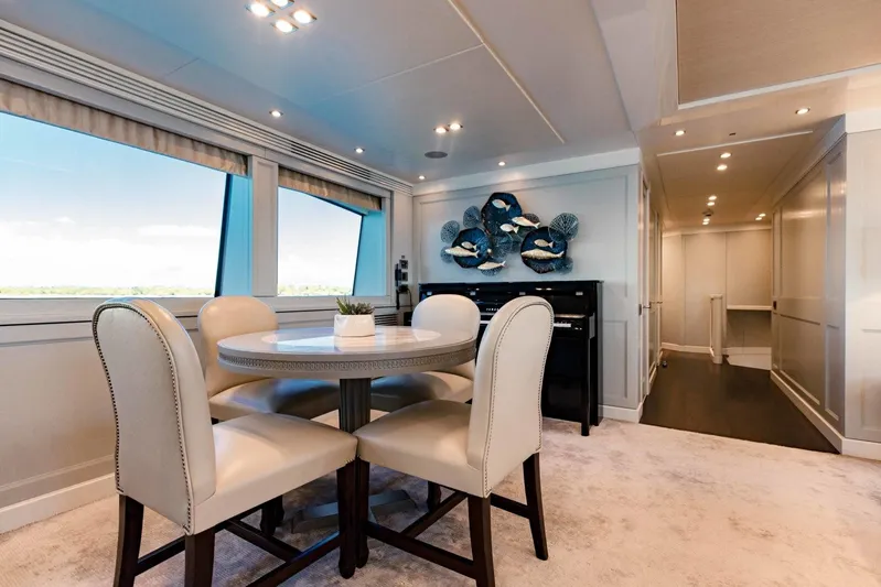 Tayrona Yacht Photos Pics Luxurious interior of 2012 Sunseeker 40 Metre Yacht with elegant dining area.