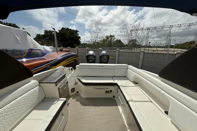  Yacht Photos Pics 2018 Sea Ray SDX 290 Outboard interior with spacious seating and dual engines.