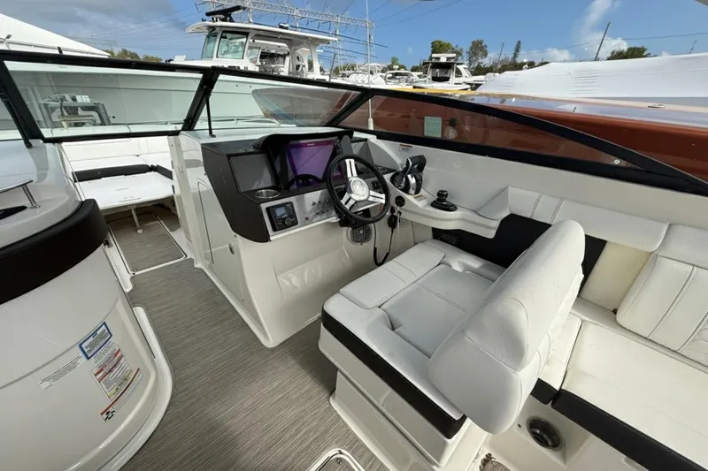  Yacht Photos Pics 2018 Sea Ray SDX 290 Outboard boat interior with modern helm and seating.