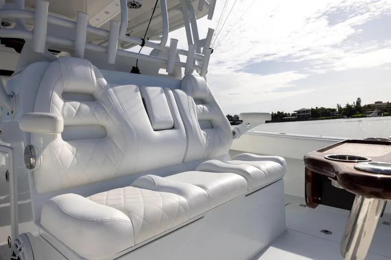  Yacht Photos Pics Luxurious seating on 2023 Freeman 42 LR boat with scenic water view.