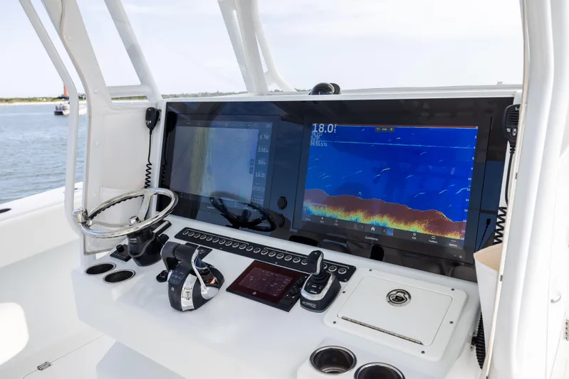  Yacht Photos Pics Control panel of 2023 Freeman 42 LR boat with advanced navigation screens.
