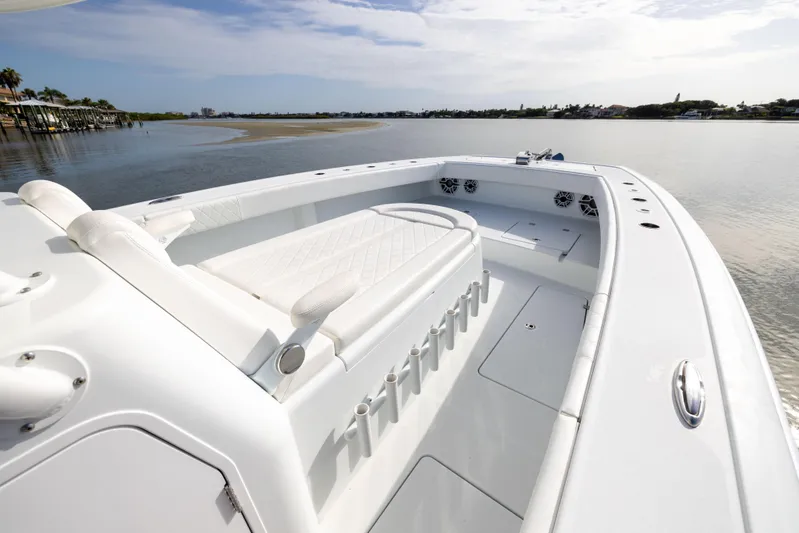  Yacht Photos Pics 2023 Freeman 42 LR boat with spacious deck and seating, cruising on calm waters.