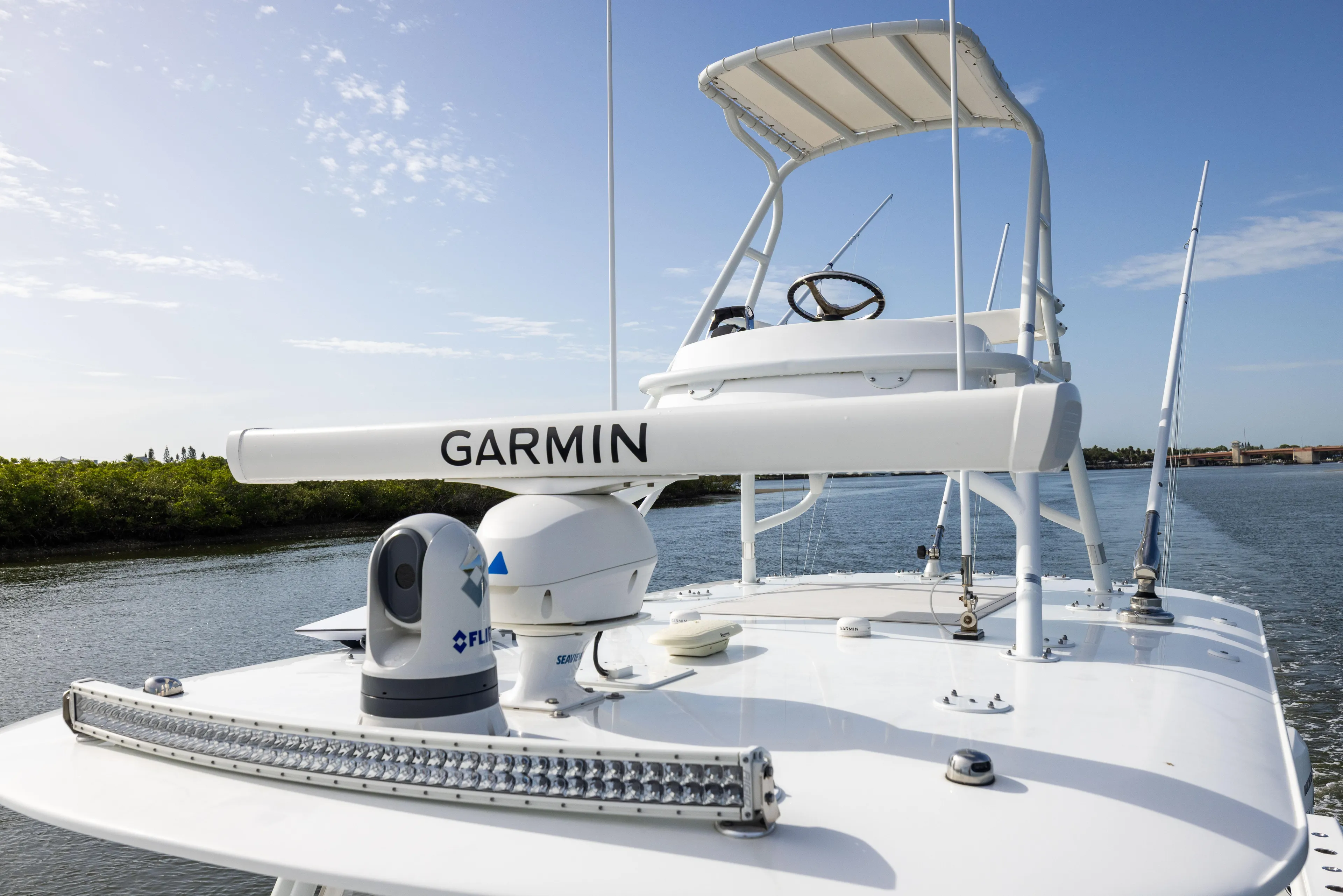  Yacht Photos Pics 2023 Freeman 42 LR boat with Garmin radar and navigation equipment on open water.