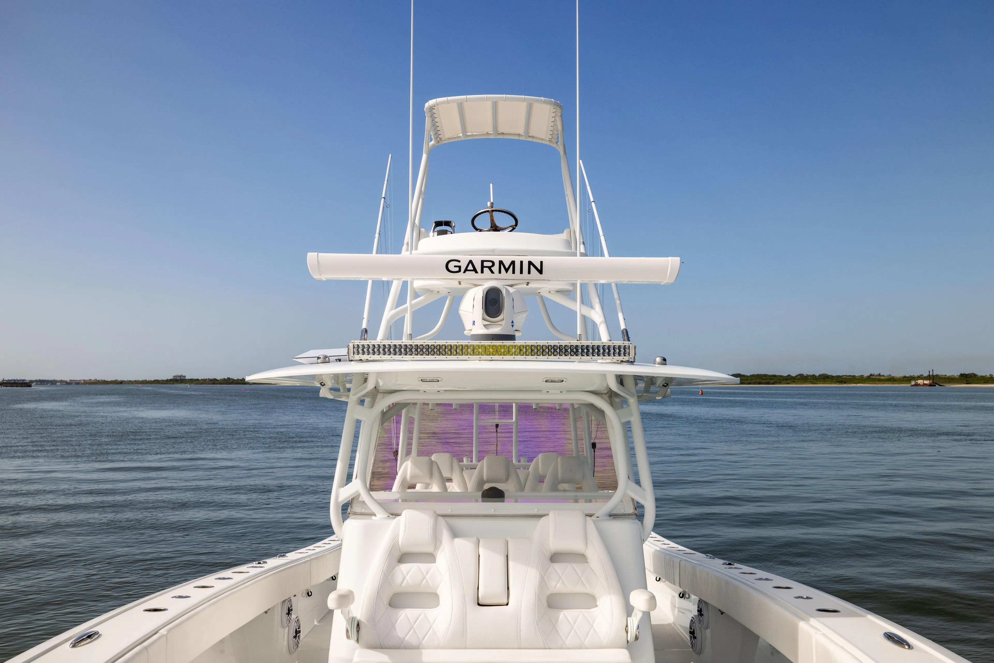  Yacht Photos Pics Freeman 42 LR boat, 2023 model, with Garmin equipment on calm water.