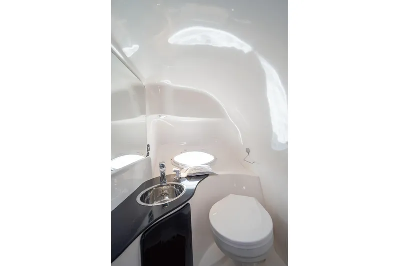  Yacht Photos Pics Modern bathroom interior in Hanover 305, 2026 model, featuring sleek sink and toilet design.