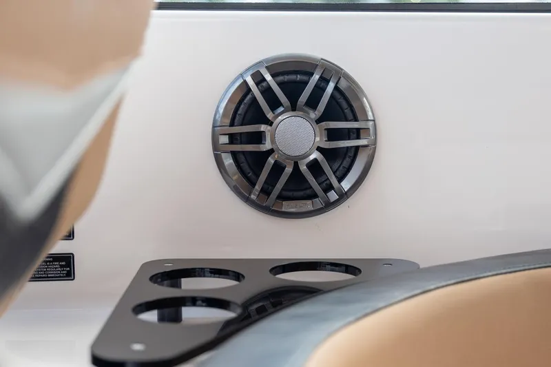  Yacht Photos Pics Speaker and cup holder in 2026 Hanover 305 boat interior.