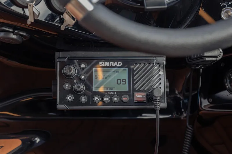  Yacht Photos Pics Simrad marine radio on Hanover 305, 2026 model, featuring distress button and digital display.