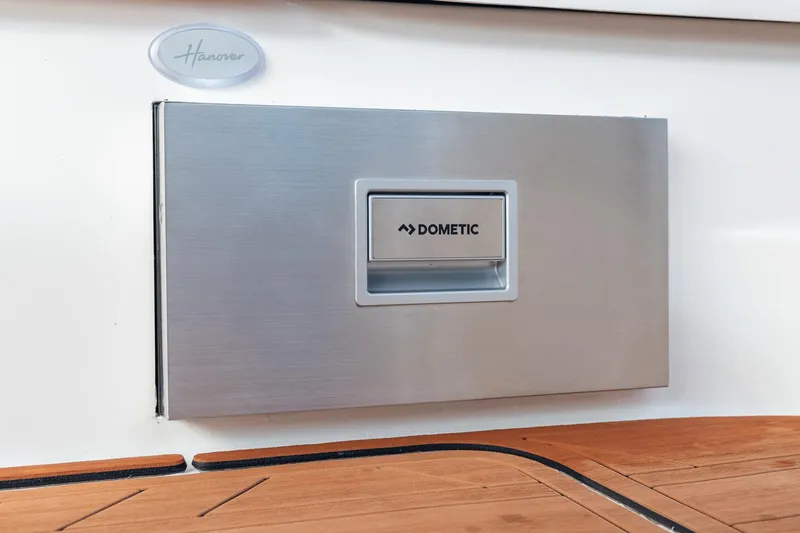  Yacht Photos Pics Hanover 305 boat with Dometic panel, 2026 model, featuring sleek design and wooden deck.