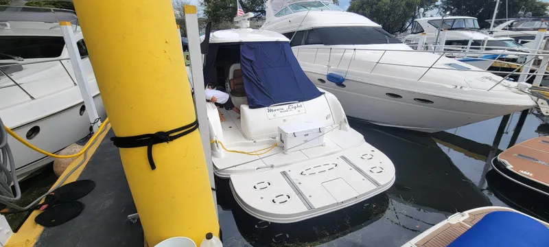  Yacht Photos Pics 2004 Sea Ray 455 Sundancer docked at marina.