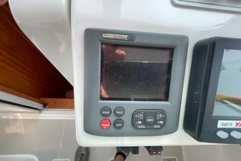 Old Fashioned (reserved) Yacht Photos Pics Control panel of a 2011 Back Cove 29 boat with navigation display.