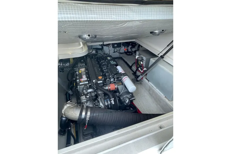 Old Fashioned (reserved) Yacht Photos Pics Engine compartment of a 2011 Back Cove 29 boat, showcasing detailed machinery.