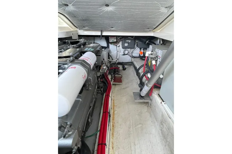 Old Fashioned (reserved) Yacht Photos Pics Engine compartment of a 2011 Back Cove 29 boat, showcasing mechanical components.