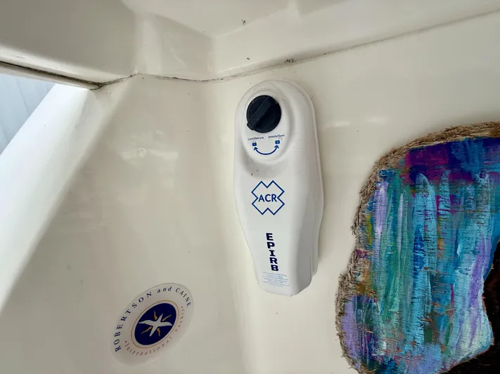 Diastema Yacht Photos Pics EPIRB device on 2016 Leopard 44 yacht, featuring ACR branding and Robertson and Caine logo.