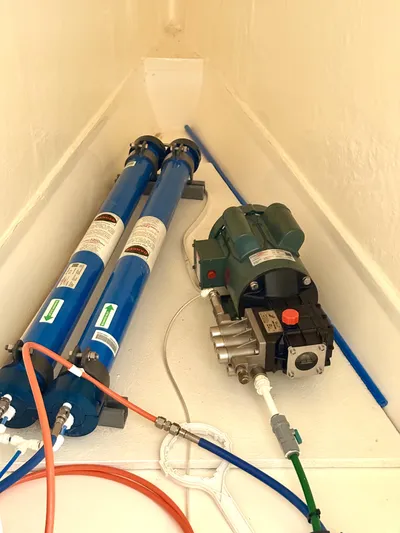 Diastema Yacht Photos Pics Water filtration system with blue cylinders and pump, Leopard 44, 2016 model.