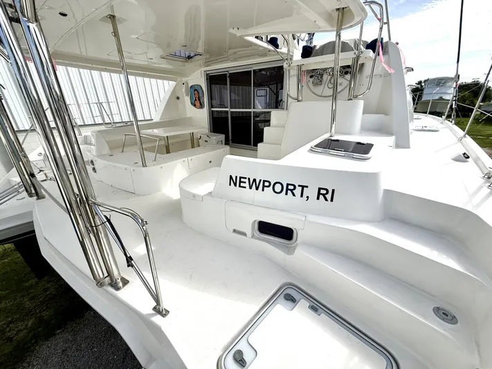 Diastema Yacht Photos Pics Leopard 44 catamaran, 2016 model, docked in Newport, RI, featuring spacious deck area.