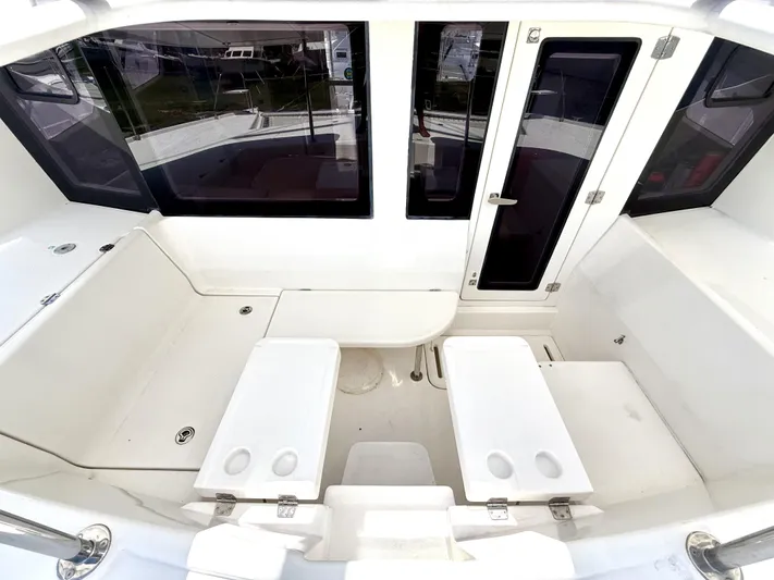 Diastema Yacht Photos Pics Spacious cockpit of 2016 Leopard 44 catamaran with seating and table.