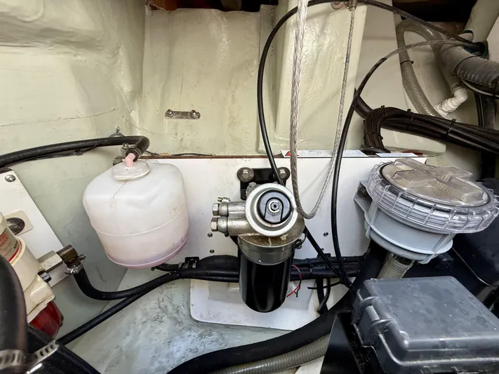 Diastema Yacht Photos Pics Engine compartment of a 2016 Leopard 44, featuring various mechanical components and wiring.