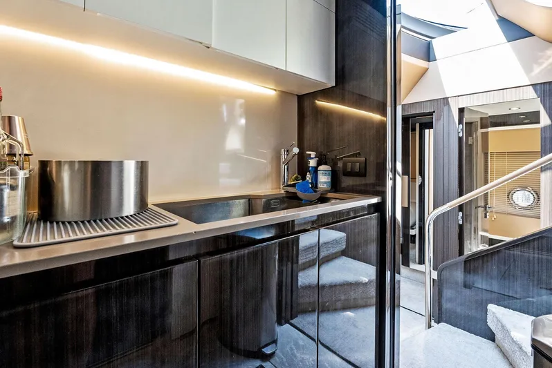 Fantastic Yacht Photos Pics Luxurious interior of 2019 Azimut 77S yacht with modern kitchen design.