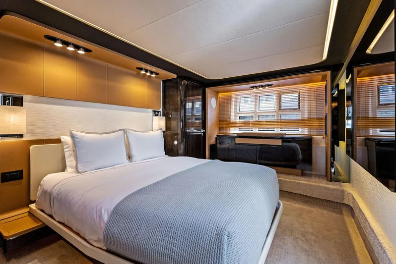 Fantastic Yacht Photos Pics Luxurious bedroom interior of 2019 Azimut 77S yacht with modern design and elegant furnishings.