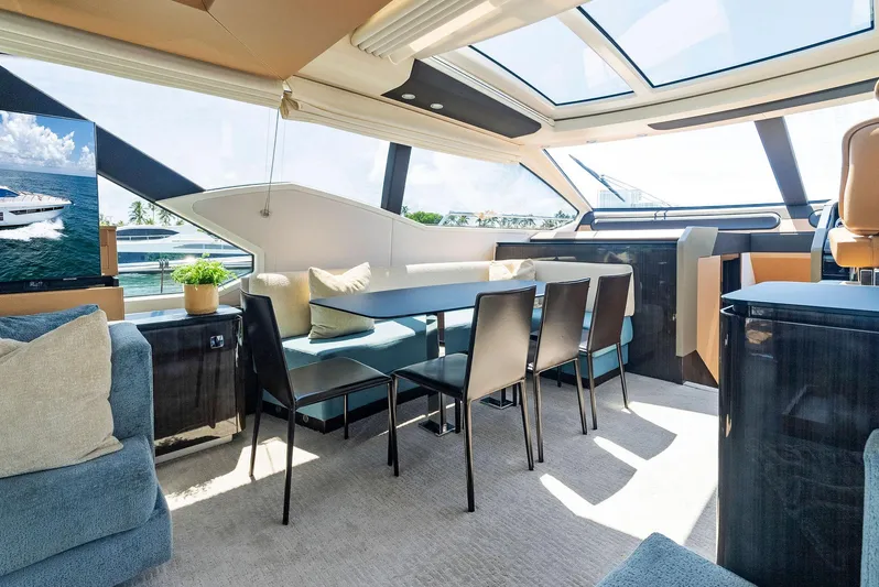 Fantastic Yacht Photos Pics Luxurious interior of 2019 Azimut 77S yacht with modern dining area and panoramic windows.