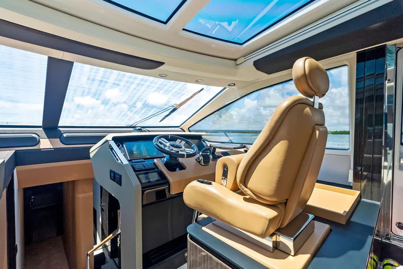 Fantastic Yacht Photos Pics Luxurious 2019 Azimut 77S yacht cockpit with leather seating and panoramic windows.