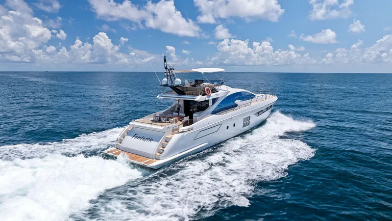Fantastic Yacht Photos Pics 2019 Azimut 77S yacht cruising on open ocean under blue sky.