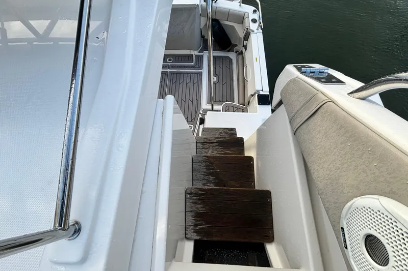  Yacht Photos Pics Interior view of Cutwater C-32 CB yacht, stairs and seating area.