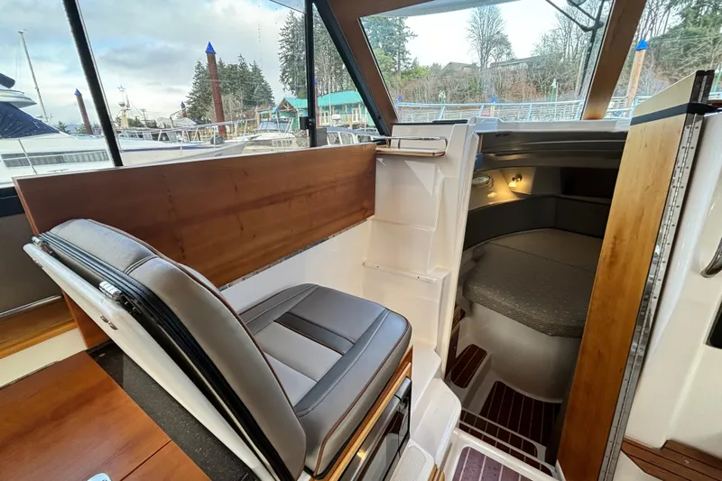  Yacht Photos Pics Interior of 2021 Cutwater C-32 CB boat with seating and cabin view.