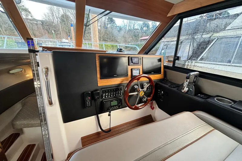  Yacht Photos Pics Interior of 2021 Cutwater C-32 CB with modern helm console.