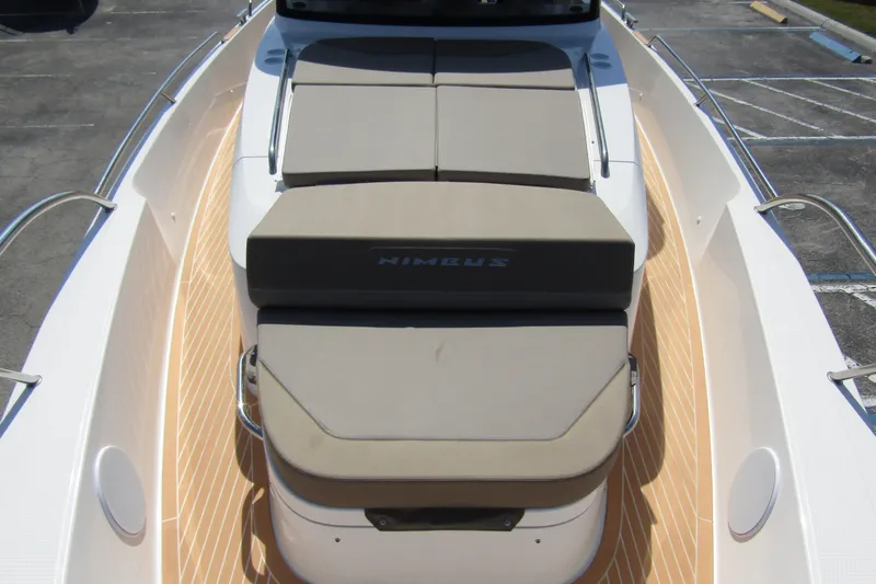  Yacht Photos Pics Nimbus Commuter 11 boat, 2025 model, featuring cushioned seating and sleek deck design.