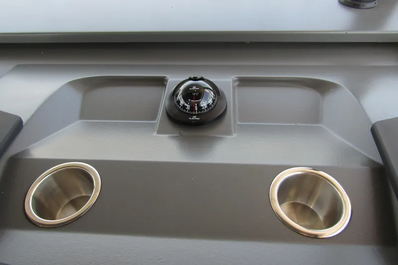  Yacht Photos Pics Dashboard of 2025 Nimbus Commuter 11 with compass and cup holders.