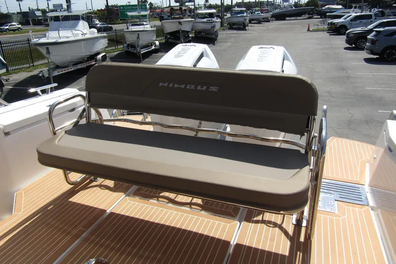  Yacht Photos Pics Nimbus Commuter 11 boat seat, 2025 model, with beige upholstery and sleek design.