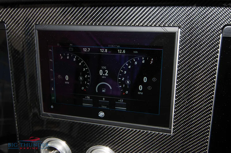  Yacht Photos Pics 2024 Fountain 38 SCX dashboard display with carbon fiber trim.