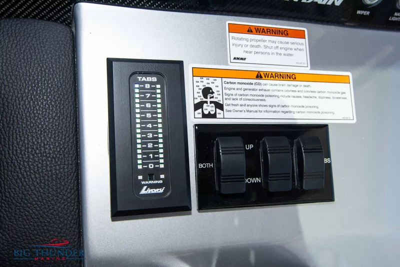  Yacht Photos Pics Control panel of a 2024 Fountain 38 SCX boat with warning labels.