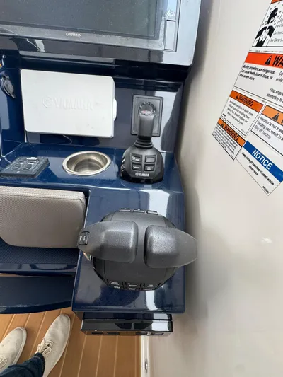  Yacht Photos Pics Control panel of a 2019 Pursuit DC 365 Dual Console boat with Yamaha controls.