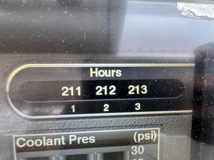 Yacht Photos Pics Display panel showing engine hours and coolant pressure on a 2019 Pursuit DC 365 Dual Console.