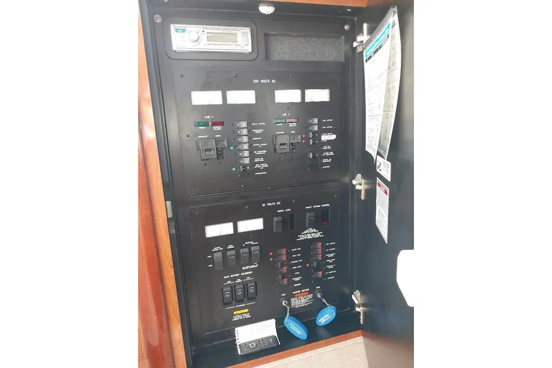 Cavok Yacht Photos Pics Electrical control panel on a 2004 Sea Ray 420 Sundancer yacht.