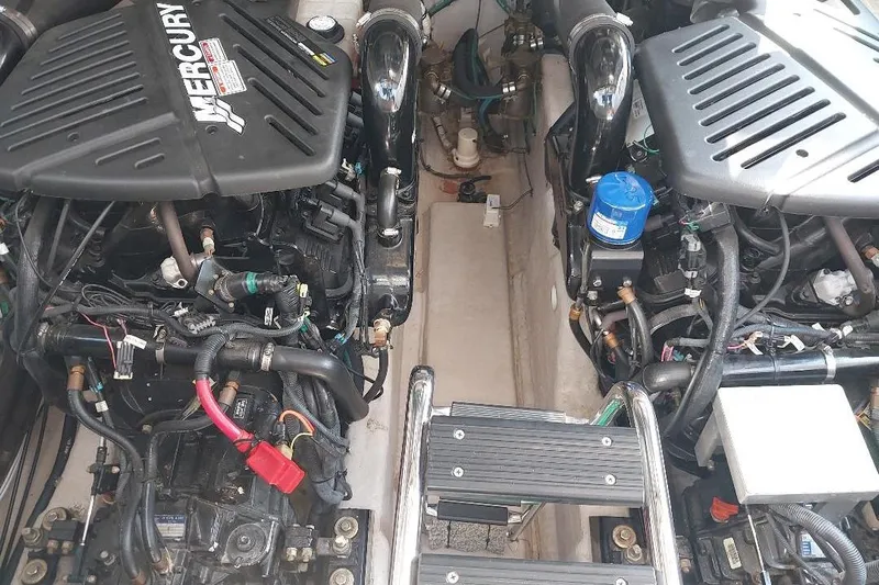 Cavok Yacht Photos Pics Engine compartment of a 2004 Sea Ray 420 Sundancer with dual Mercury engines.