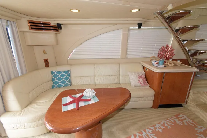  Yacht Photos Pics Luxurious interior of 2001 Sea Ray 540 Cockpit Motor Yacht with elegant seating and decor.