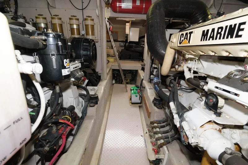 Yacht Photos Pics Engine room of 2001 Sea Ray 540 Cockpit Motor Yacht with CAT Marine engines.