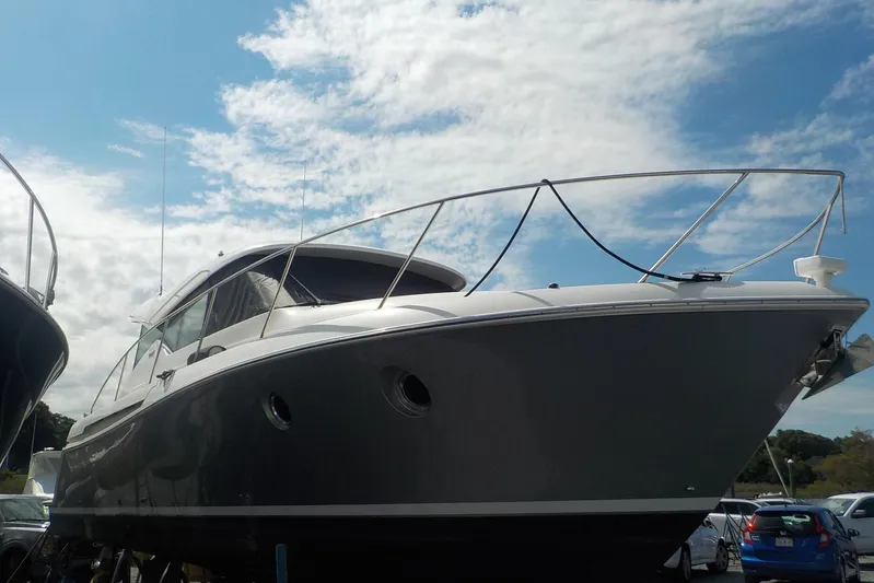 "double Dimond" Yacht Photos Pics 2018 Tiara Yachts 39 Coupe under a partly cloudy sky.