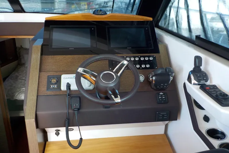 "double Dimond" Yacht Photos Pics 2018 Tiara Yachts 39 Coupe helm with Garmin navigation and modern controls.