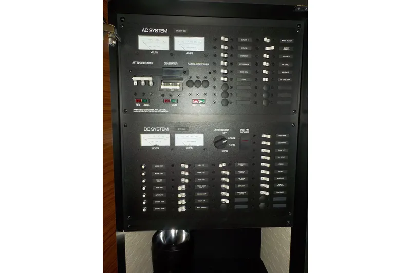 "double Dimond" Yacht Photos Pics Electrical control panel on a 2018 Tiara Yachts 39 Coupe, featuring AC and DC systems.