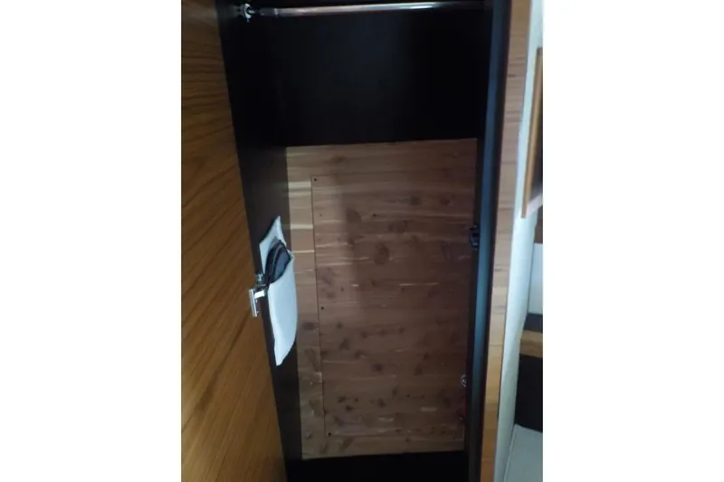 "double Dimond" Yacht Photos Pics Interior wooden closet in 2018 Tiara Yachts 39 Coupe, featuring sleek design and storage space.