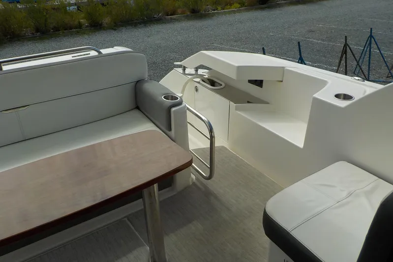 "double Dimond" Yacht Photos Pics 2018 Tiara Yachts 39 Coupe interior with seating and table in cockpit area.
