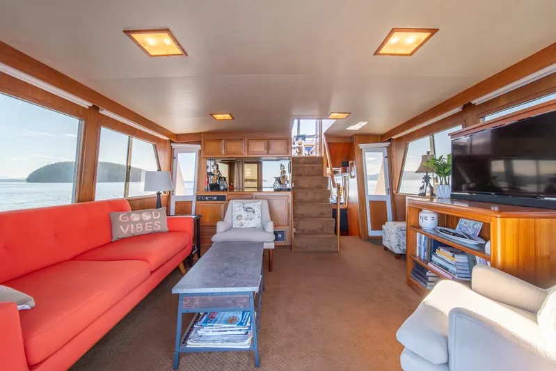 Take Chances Yacht Photos Pics Luxurious 1986 Ocean Alexander Cockpit M/Y yacht interior with modern furnishings and scenic views.