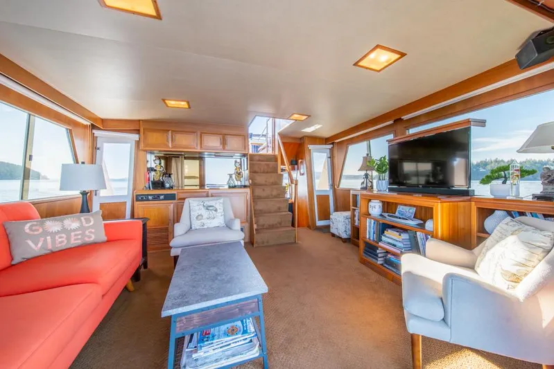 Take Chances Yacht Photos Pics Luxurious 1986 Ocean Alexander Cockpit M/Y yacht interior with cozy seating and modern decor.